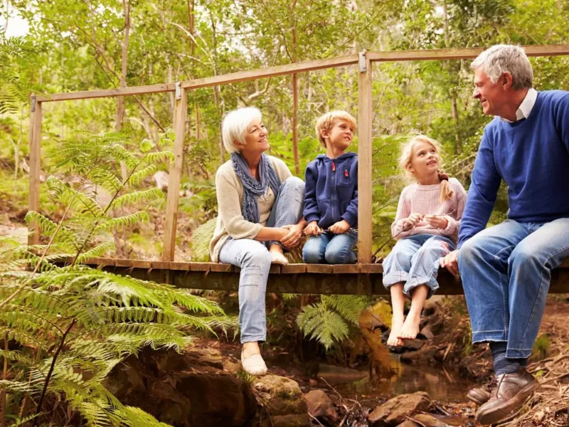 Family sat in the forest